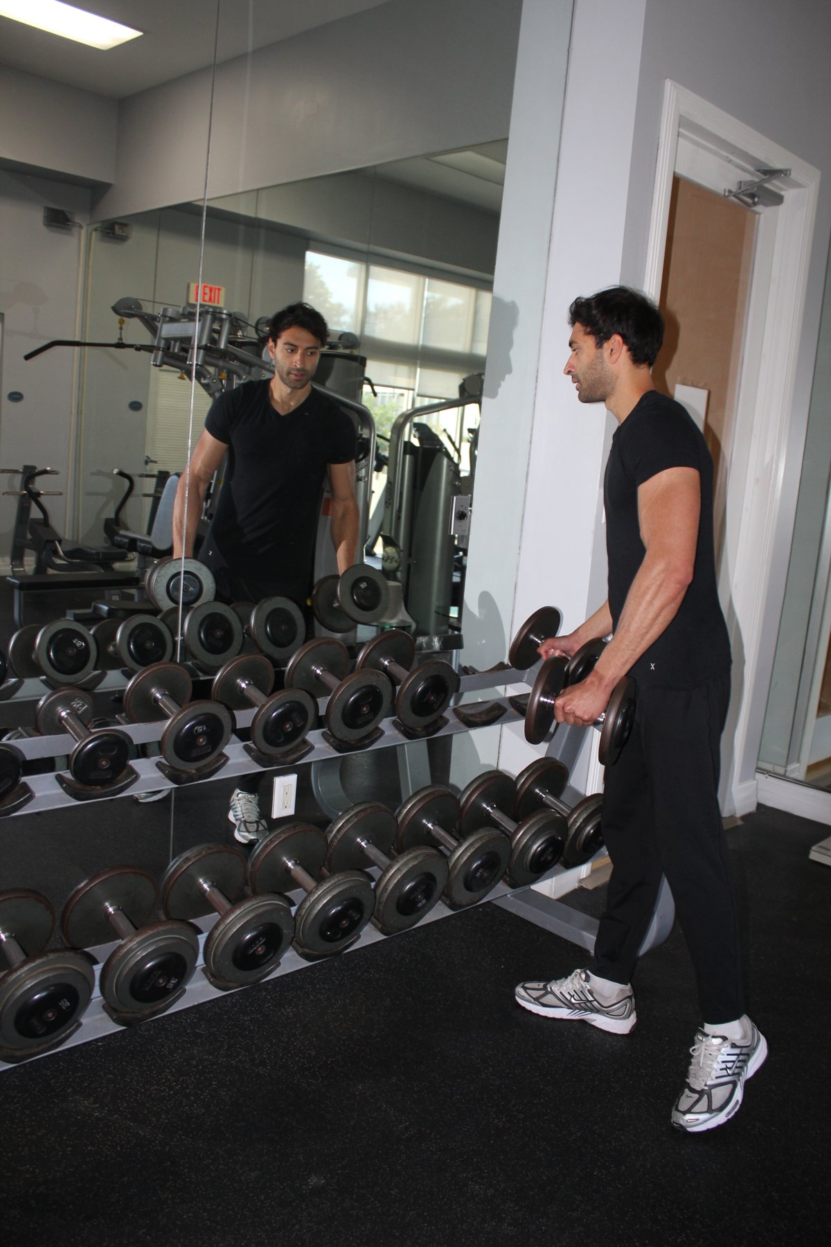 Rohan Lulla, founder of Coastal Performance, training in the gym